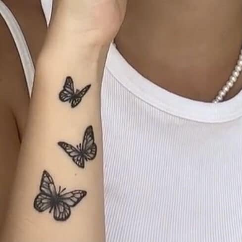 butterfly hand tattoo